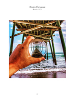 Lensball reflecting a pier, still life photography