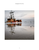 Rusted trawler beached at dusk, coastal photography