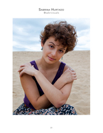 Portrait of a woman seated on the dunes, portrait photography