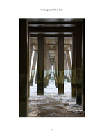 Symmetrical view beneath a pier's pilings, architecture photography