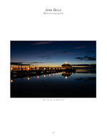 Screw-pile lighthouse glowing before dawn, landscape photography