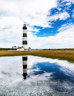 Lighthouse architecture photography reflected in a marsh pool