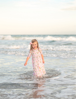 child in the surf portrait photography