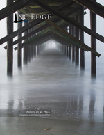 landscape photography of a foggy pier tunnel