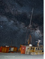 night sky astrophotography of a shipwreck under the Milky Way