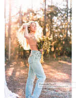 portrait photography in golden hour light among the pines