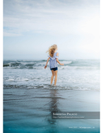 portrait photography of a girl wading in the waves