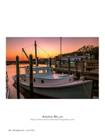 coastal photography of a fishing trawler docked at sunset