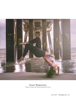 Acrobatic portrait photography under the pier