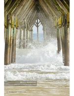 pier photography of a crashing wave