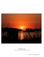 sunset photography of a boat at anchor