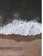 aerial photography of a surf line