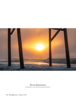 pier photography of sunrise between the pilings