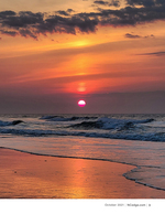 Crimson sunrise landscape photography over the ocean