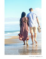 Couple portrait photography walking the shoreline