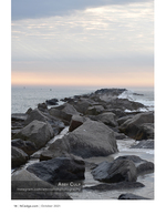 Rock jetty seascape photography at dusk