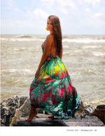 Fashion portrait photography on beach rocks