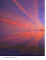 Fire sky landscape photography reflected on the water