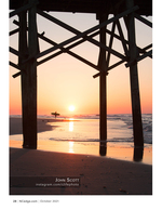Surfer transportation photography under the pier at sunrise
