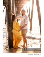 Maternity portrait photography under the pier at sunset