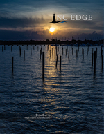 Sunset over the marina pilings, coastal photography