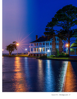 Historic waterfront manor at dusk, architecture photography