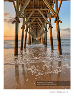 Beneath the pier at sunset, coastal photography