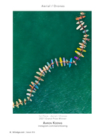 Aerial chain of surfers aerial photography off the coast