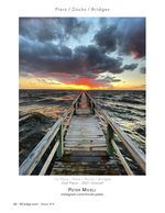 Pier architecture photography beneath a stormy sunset sky
