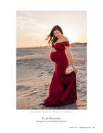 Maternity portrait photography in a red gown on the sand